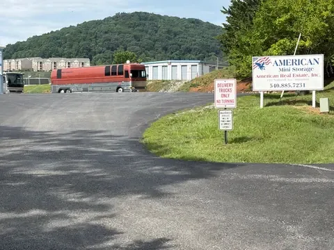 Driveway entrance and sign at American Mini Storage on National Avenue, the way in to the climate-controlled building at American Mini Storage in Staunton, VA