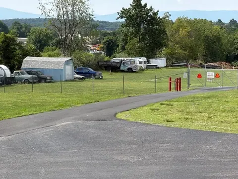 Fenced and gated outdoor parking area for RVs, boats, trailers and work vehicles at the Staunton storage facility